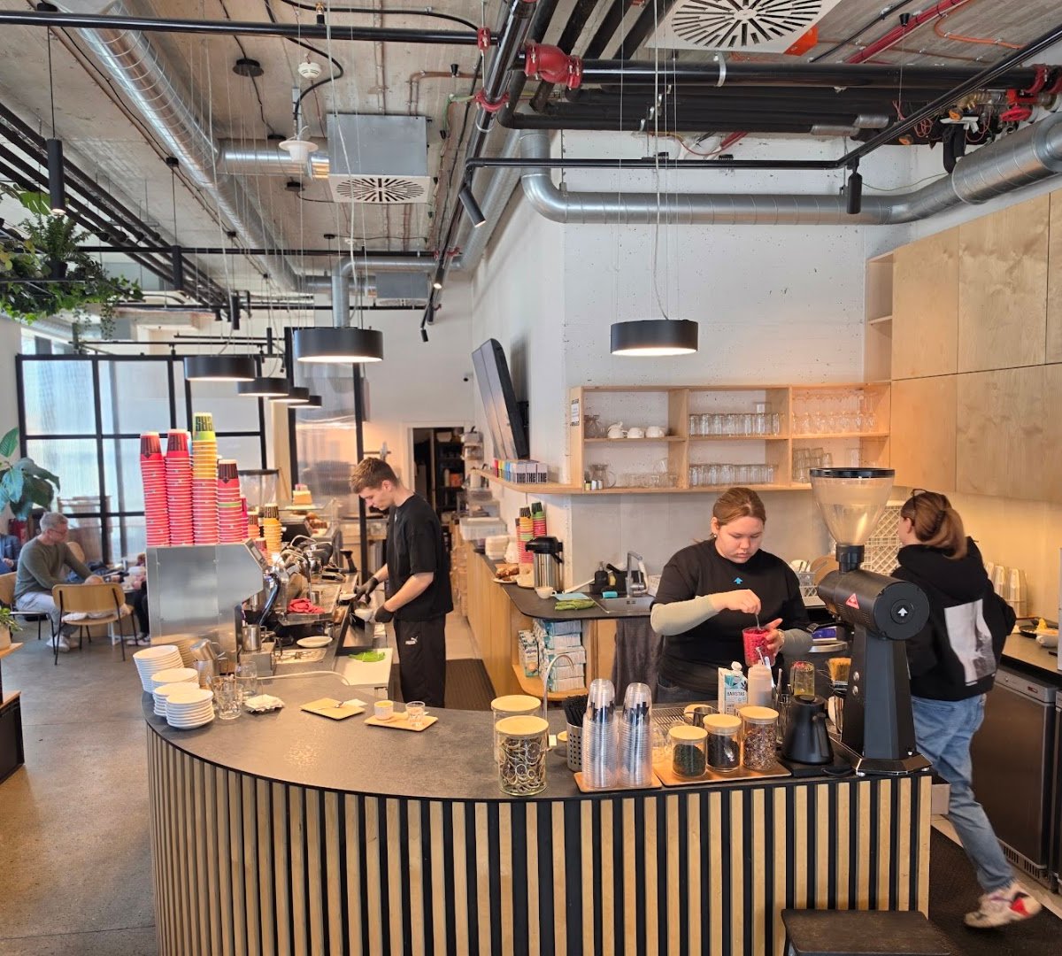 Interior of The Miners Coffee Churchill, specialty coffee shop in Prague