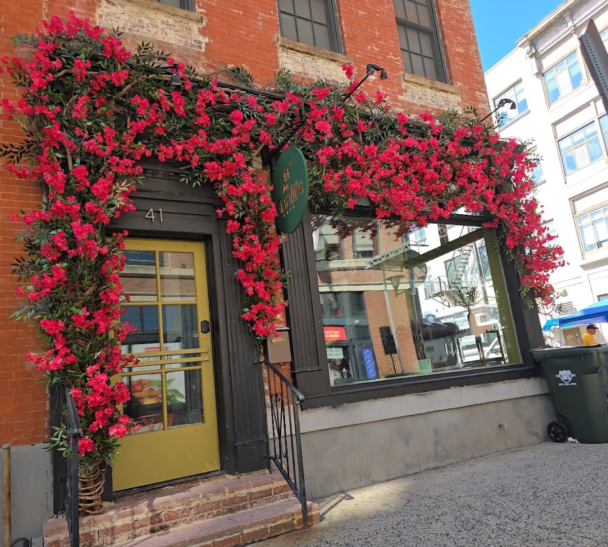 Storefront of Qaalii's Cafe, specialty coffee shop in Newark