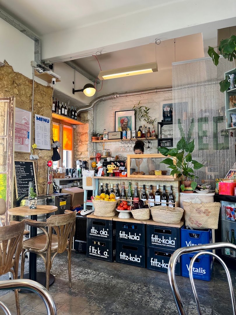 Interior of PENTAGON - Specialty coffee / Vegetarian food / Natural wine / Affordable art, specialty coffee shop in Lisbon