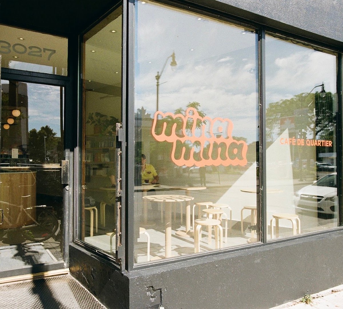Storefront of Cafe Mina Mina, specialty coffee shop in Montreal