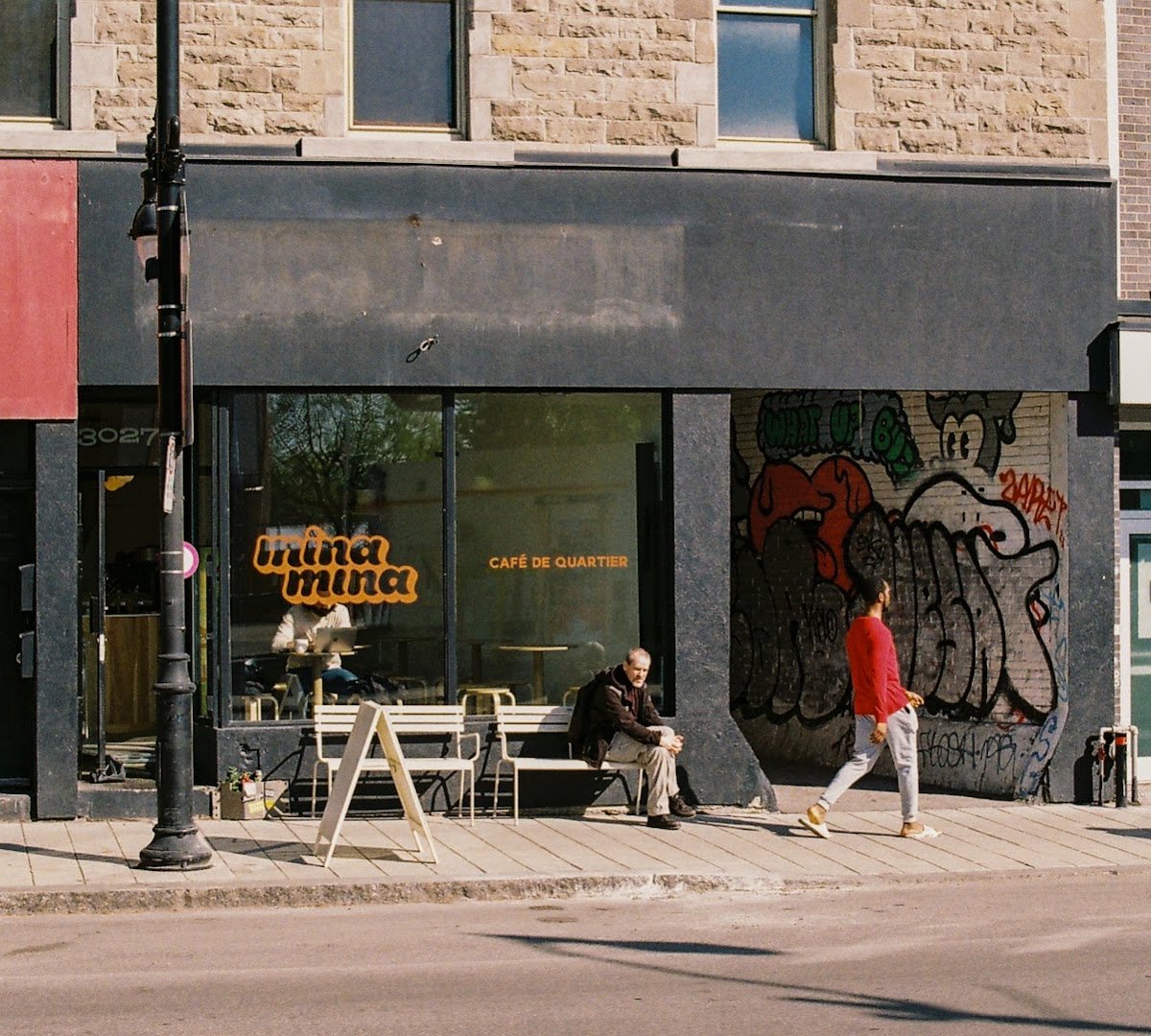 Storefront of Cafe Mina Mina, specialty coffee shop in Montreal