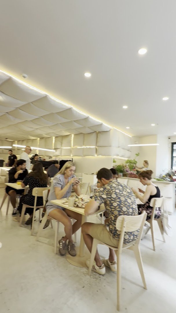 Interior of The Folks Santos, specialty coffee shop in Lisbon