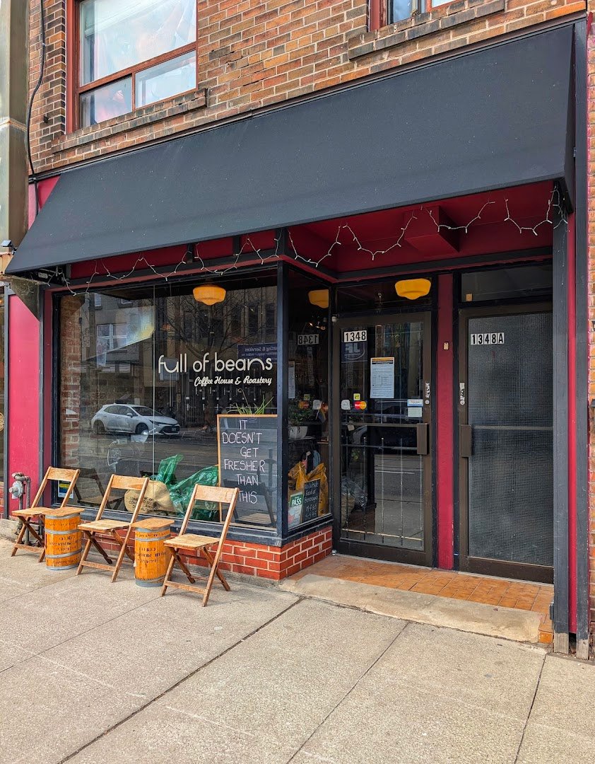 Storefront of full of beans Coffee House & Roastery, specialty coffee shop in Toronto