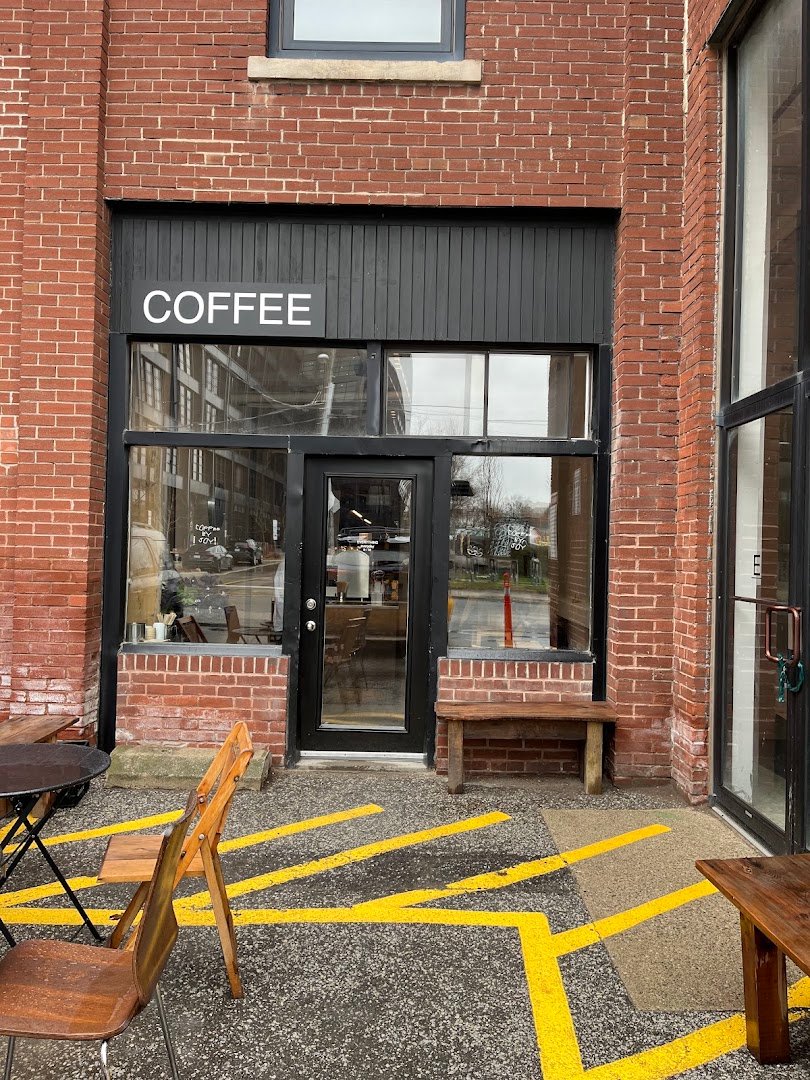 Storefront of Coffee By Joy, specialty coffee shop in Toronto
