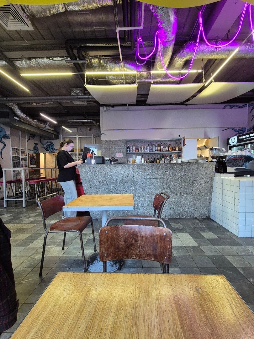 Interior of The Cool Cat, specialty coffee shop in Warsaw