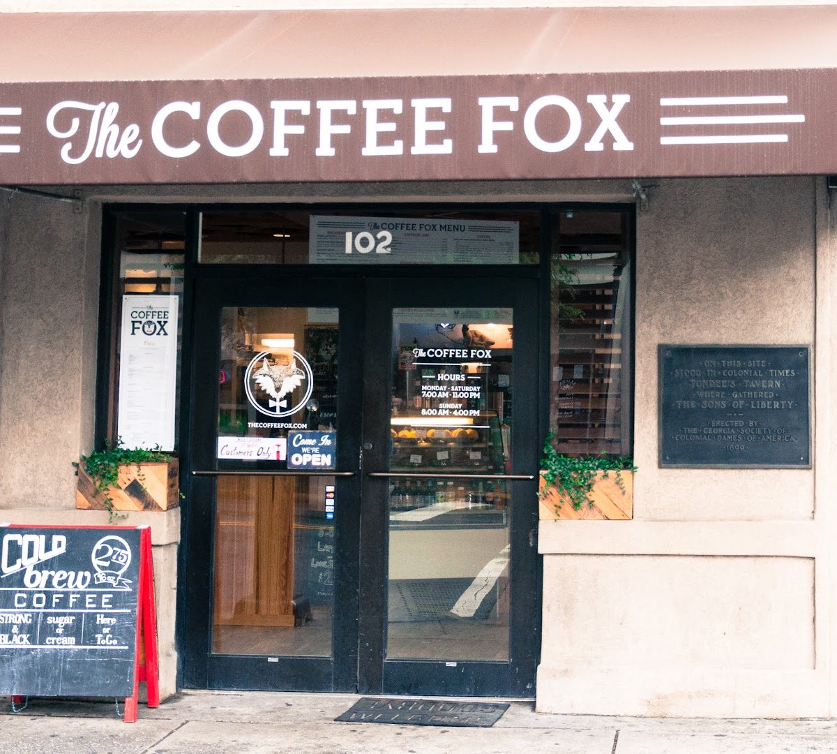 Storefront of The Coffee Fox Roasting Co., specialty coffee shop in Savannah