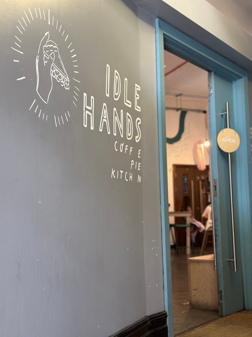 Storefront of Idle Hands Coffee, specialty coffee shop in Manchester