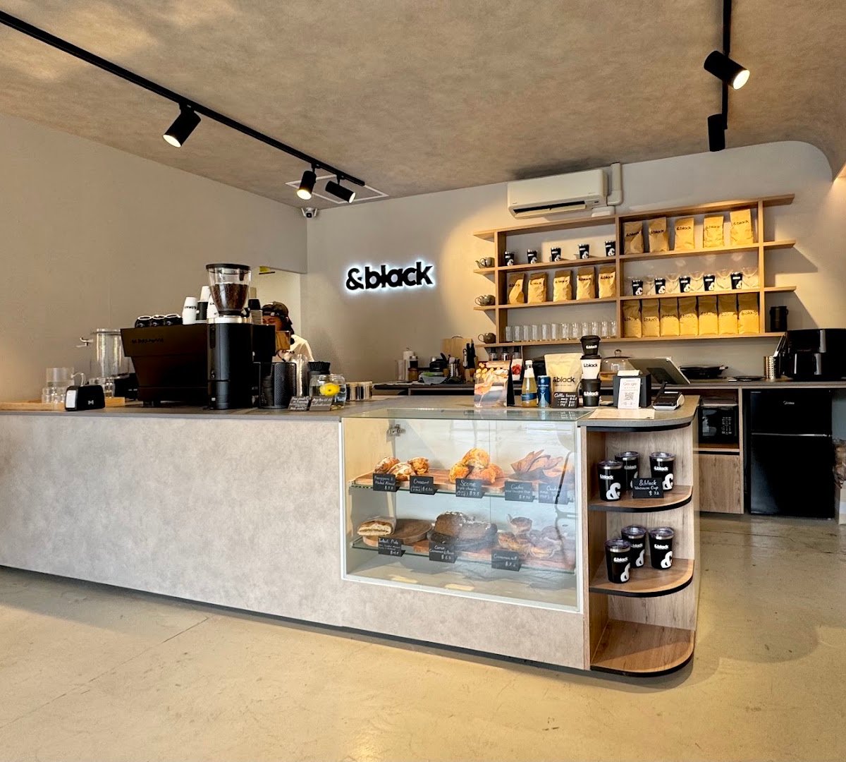 Interior of &black, specialty coffee shop in Auckland