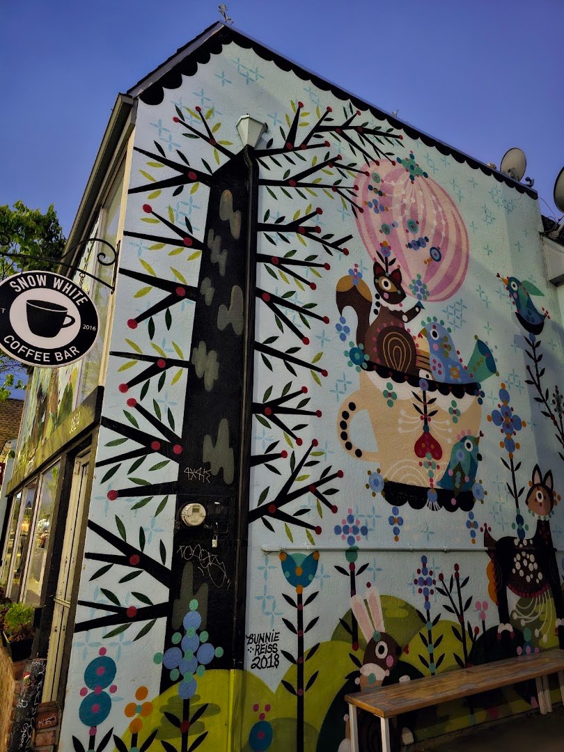 Storefront of Snow White Coffee, specialty coffee shop in Oakland