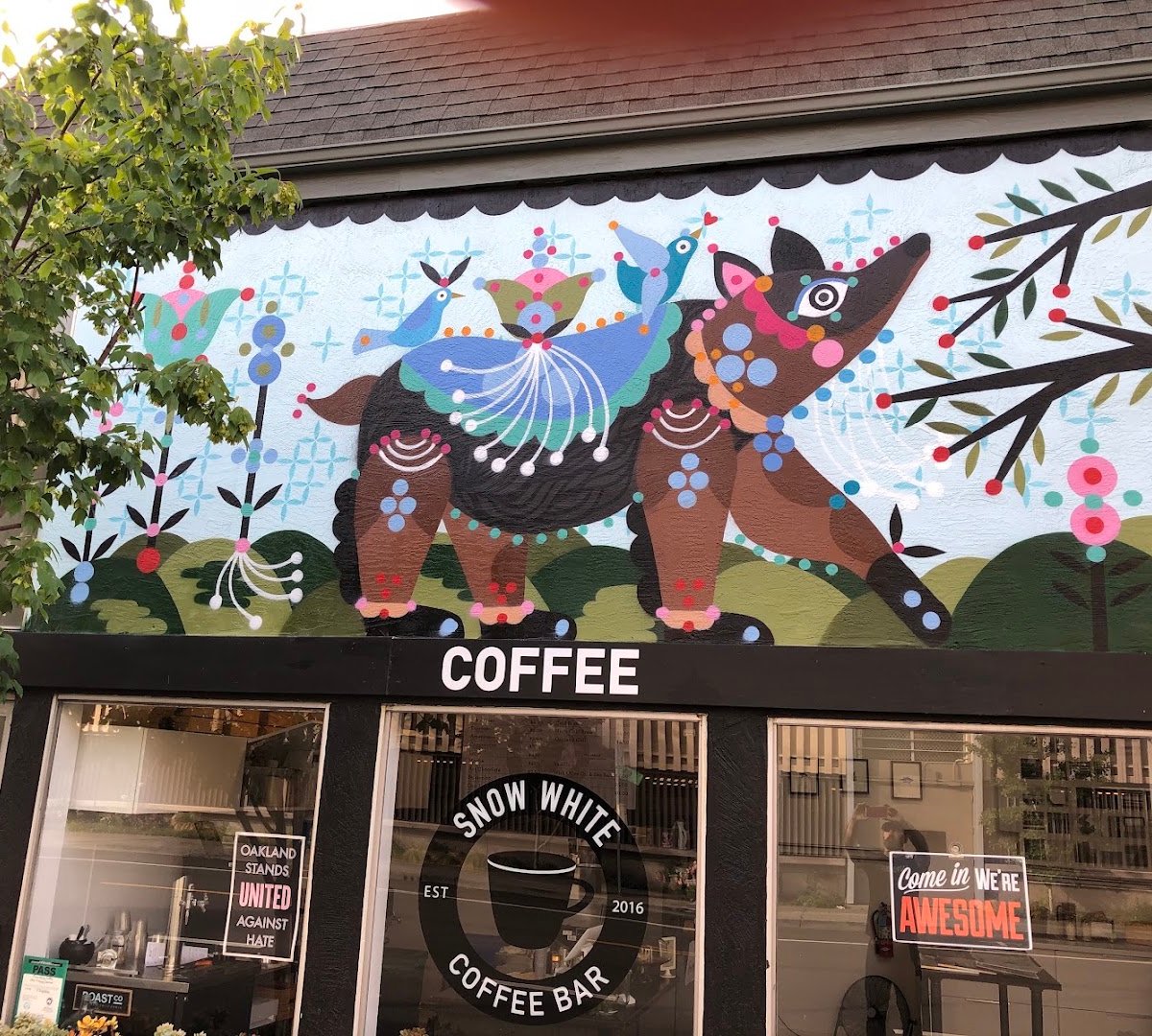 Storefront of Snow White Coffee, specialty coffee shop in Oakland