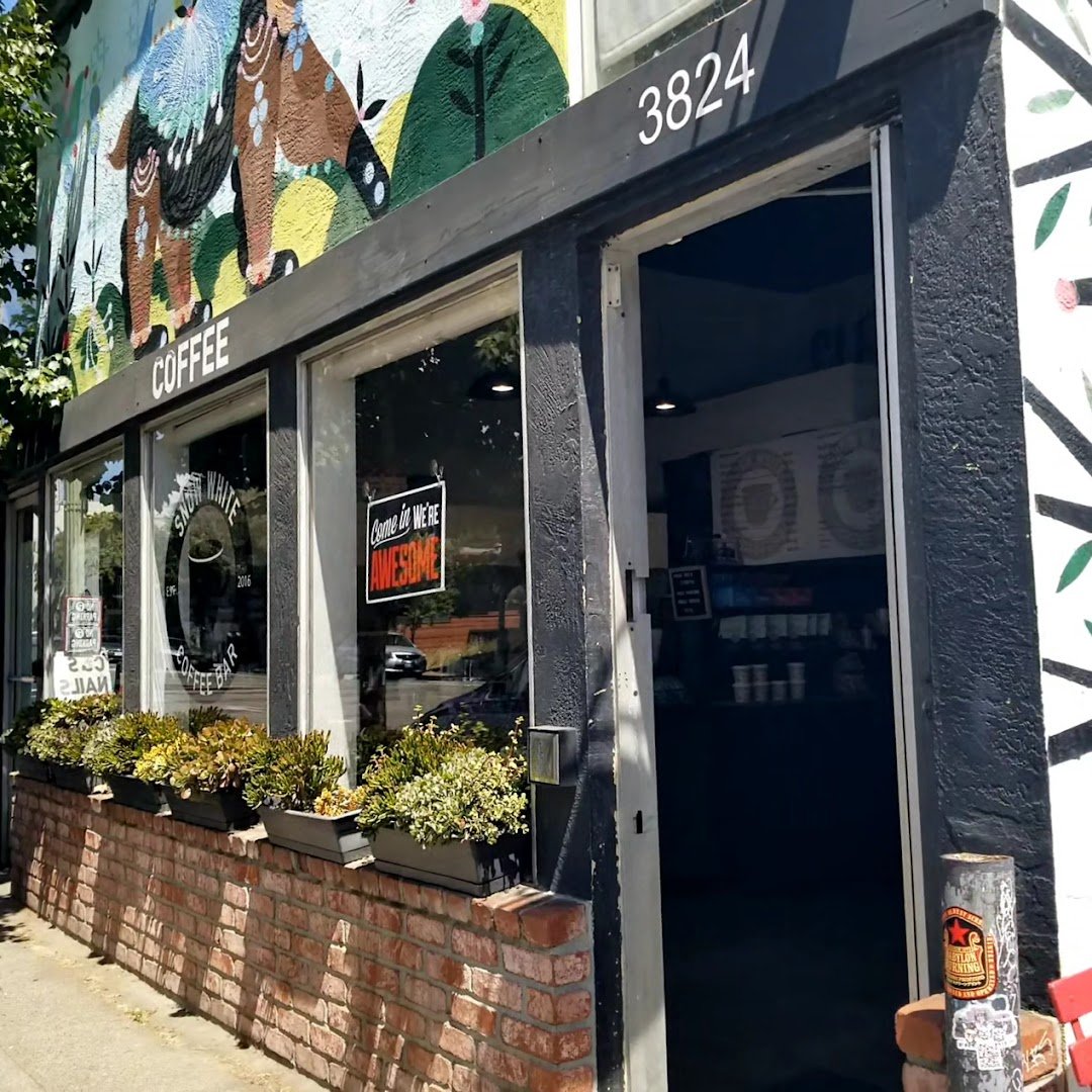 Storefront of Snow White Coffee, specialty coffee shop in Oakland
