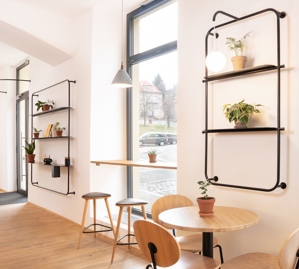 Interior of TYPIKA Nusle, specialty coffee shop in Prague