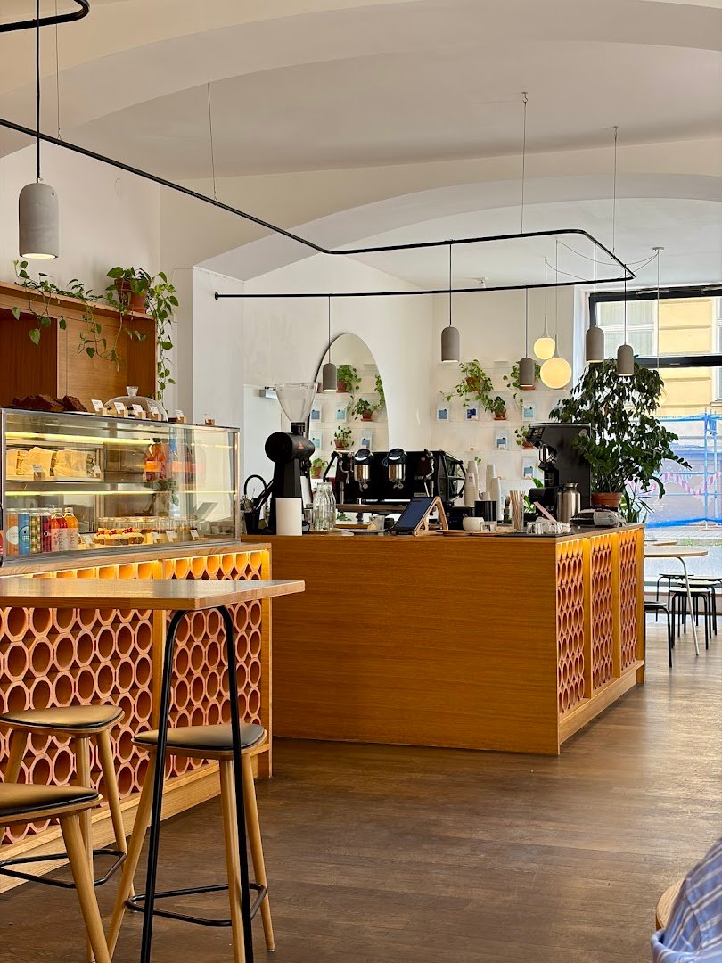 Interior of TYPIKA Nusle, specialty coffee shop in Prague