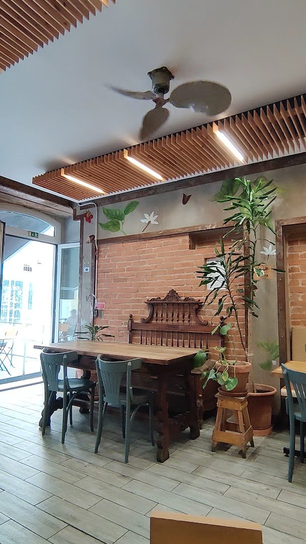 Interior of Fábrica Coffee Roasters, specialty coffee shop in Lisbon
