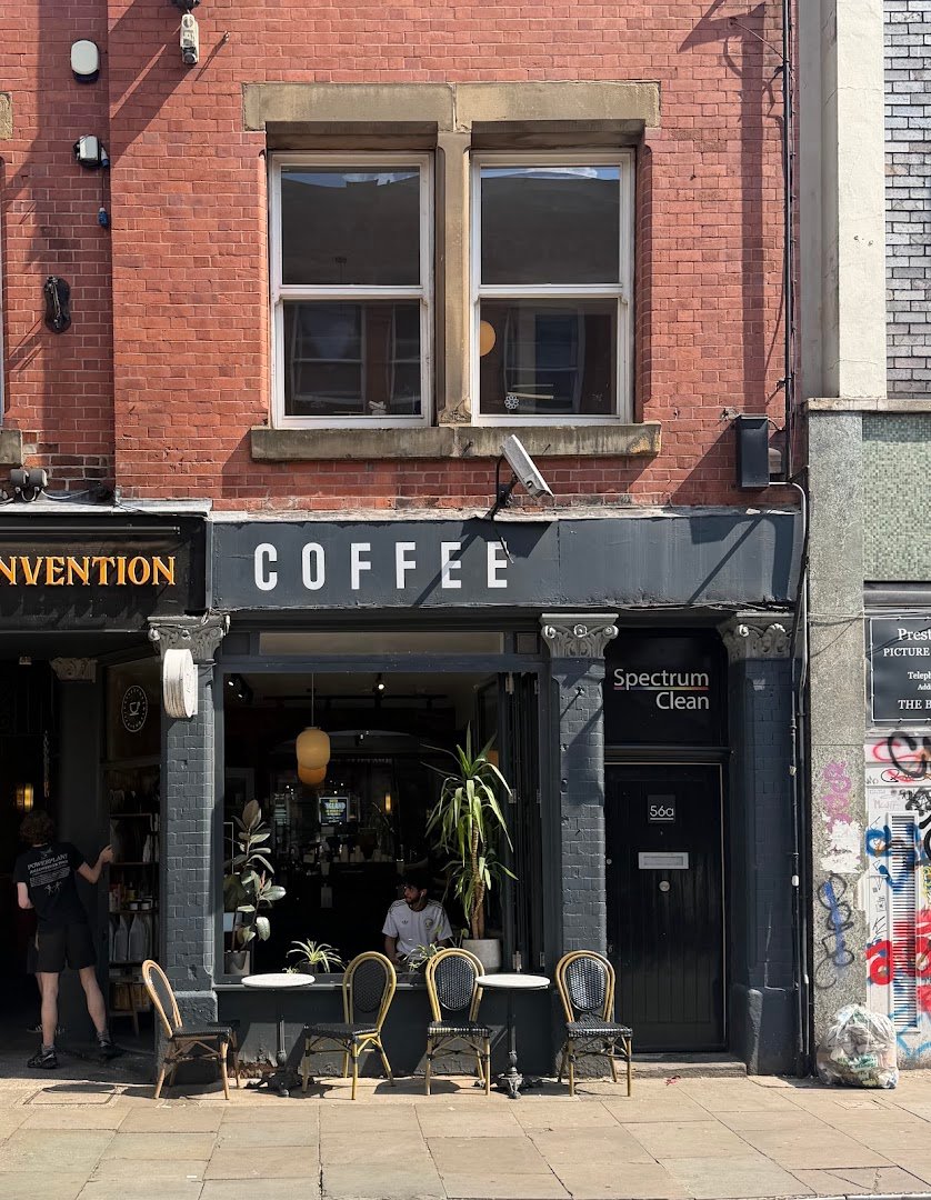 Storefront of Just Between Friends Coffee, specialty coffee shop in Manchester
