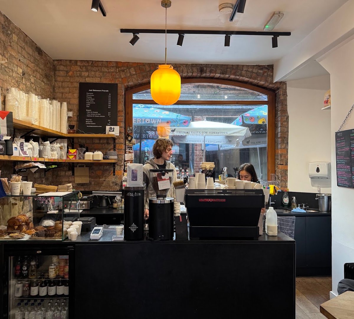 Interior of Just Between Friends Coffee, specialty coffee shop in Manchester