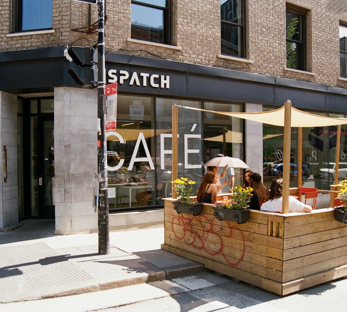 Storefront of Dispatch Coffee, specialty coffee shop in Montreal
