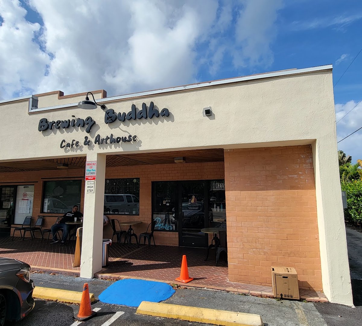Storefront of Brewing Buddha Cafe & Arthouse, specialty coffee shop in Miami