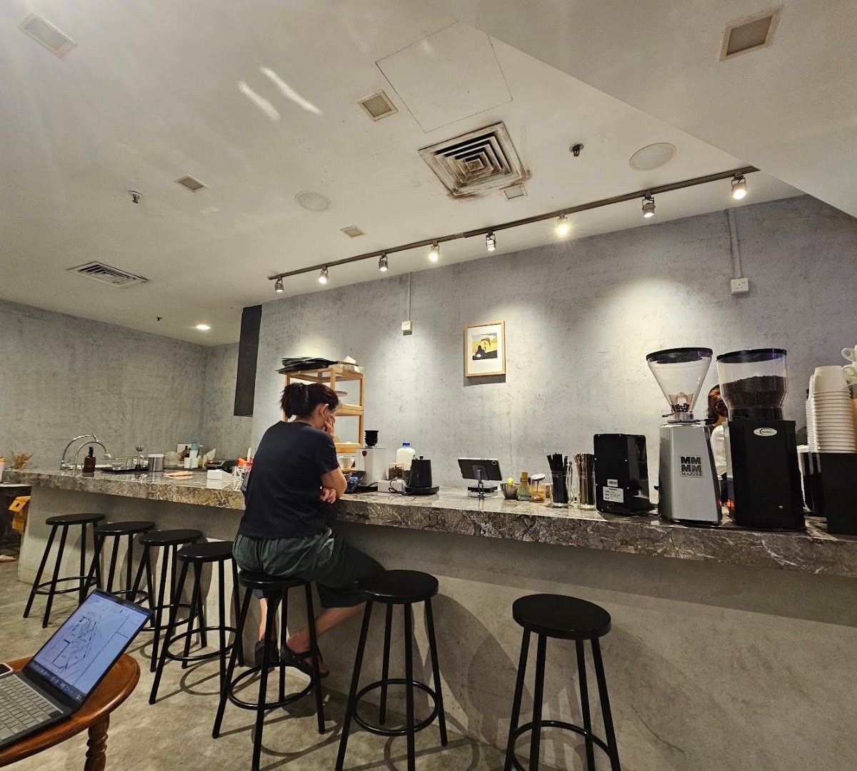 Interior of Piccolo By Hei Kim, specialty coffee shop in Singapore