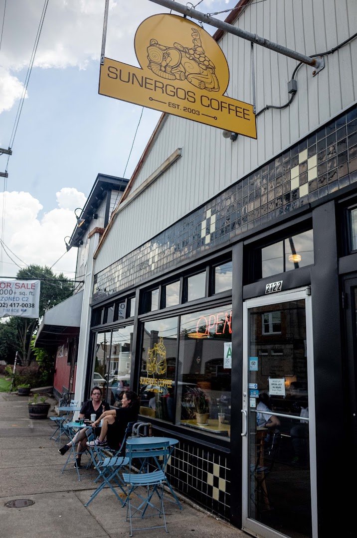 Storefront of Sunergos Coffee, specialty coffee shop in Louisville