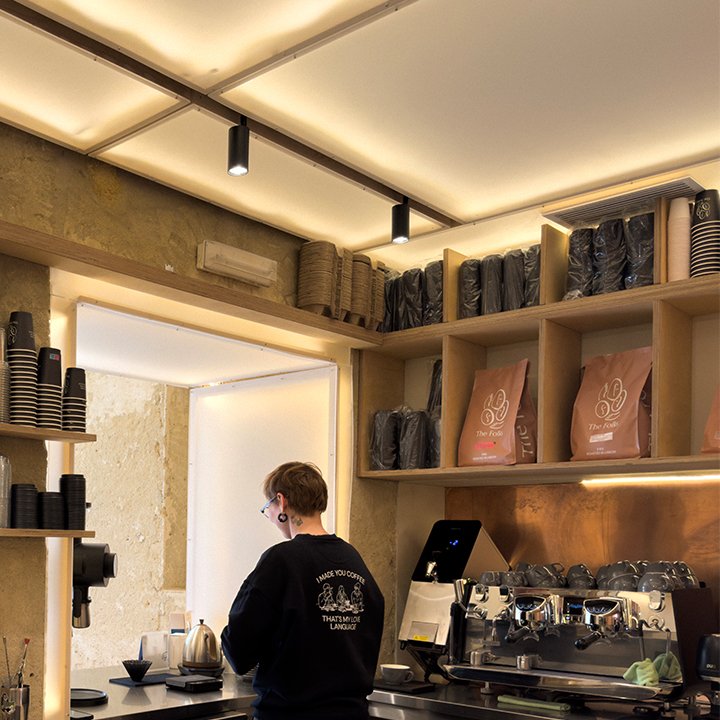 Interior of The Folks Belém, specialty coffee shop in Lisbon