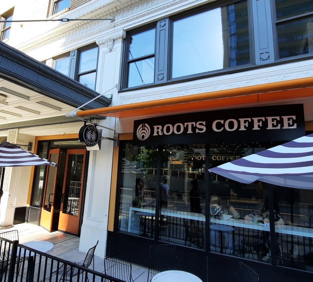 Storefront of Roots Coffee, specialty coffee shop in Sacramento
