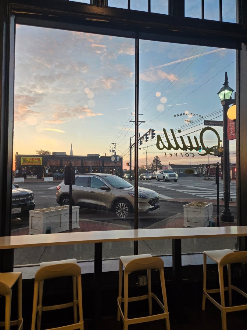 Storefront of Quills Coffee, specialty coffee shop in Louisville