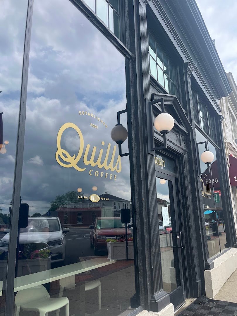 Storefront of Quills Coffee, specialty coffee shop in Louisville