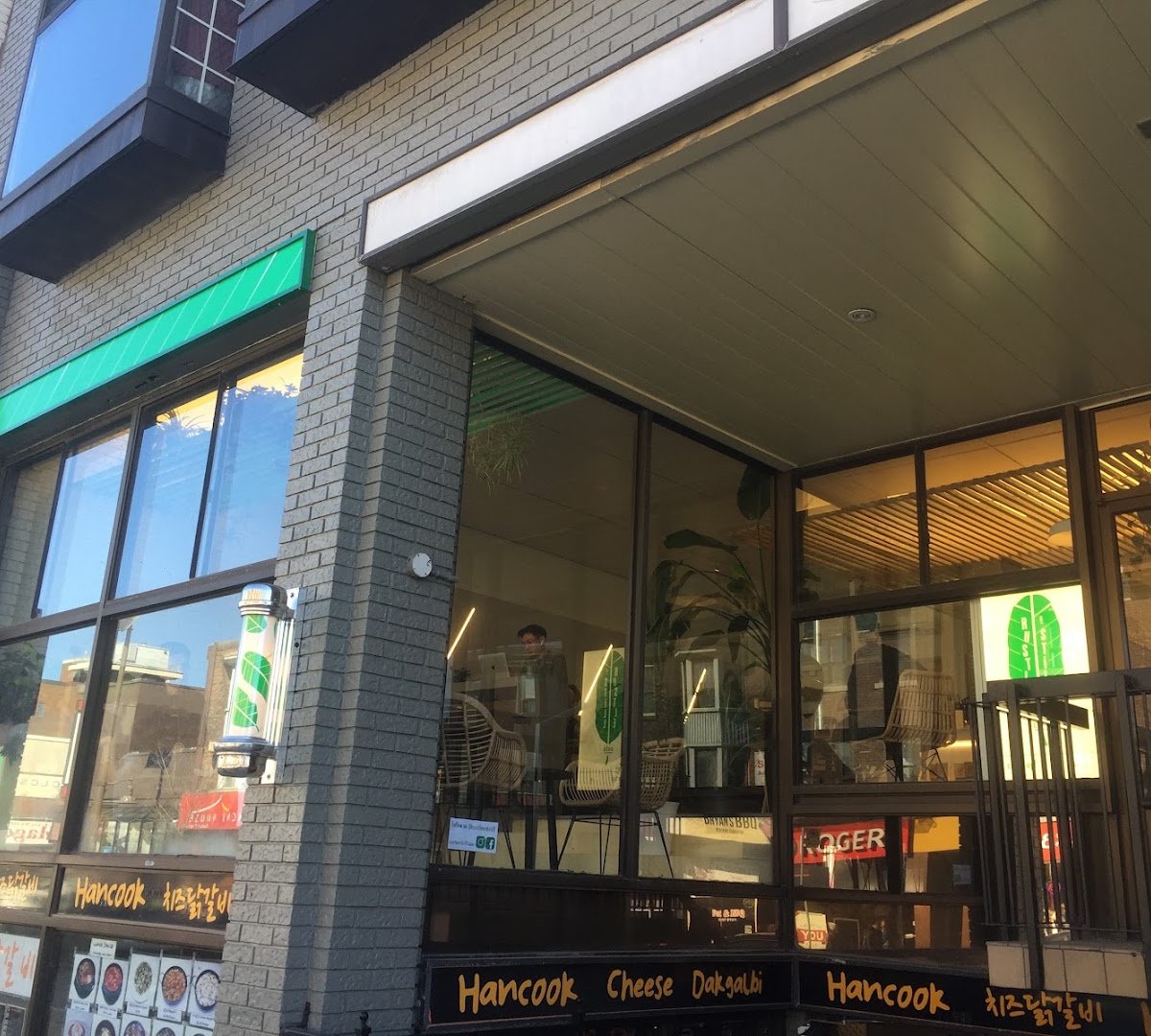 Storefront of Rustle & Still Café, specialty coffee shop in Toronto