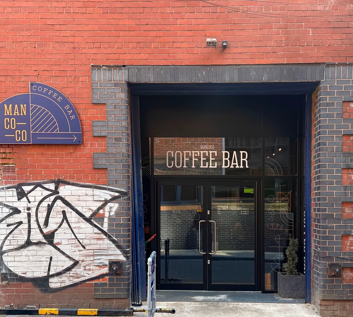 Storefront of Mancoco Coffee Bar, Roastery & Barista Training School, specialty coffee shop in Manchester