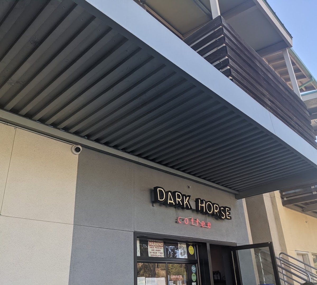 Storefront of Dark Horse Coffee Roasters, specialty coffee shop in San Diego