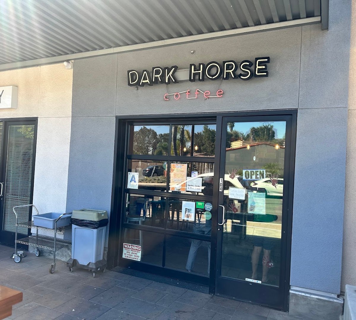 Storefront of Dark Horse Coffee Roasters, specialty coffee shop in San Diego