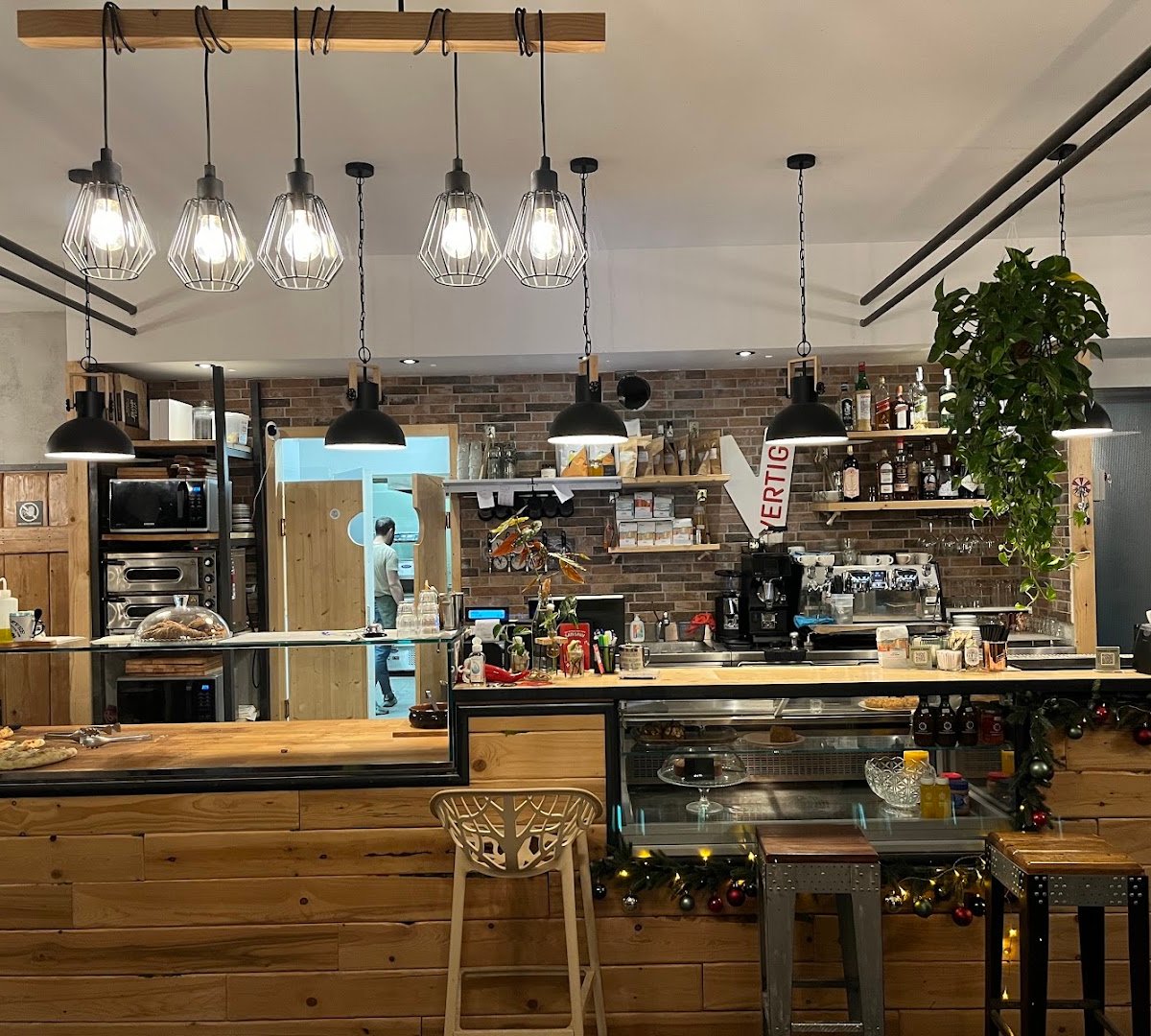 Interior of RADICI Social Food, specialty coffee shop in Rome