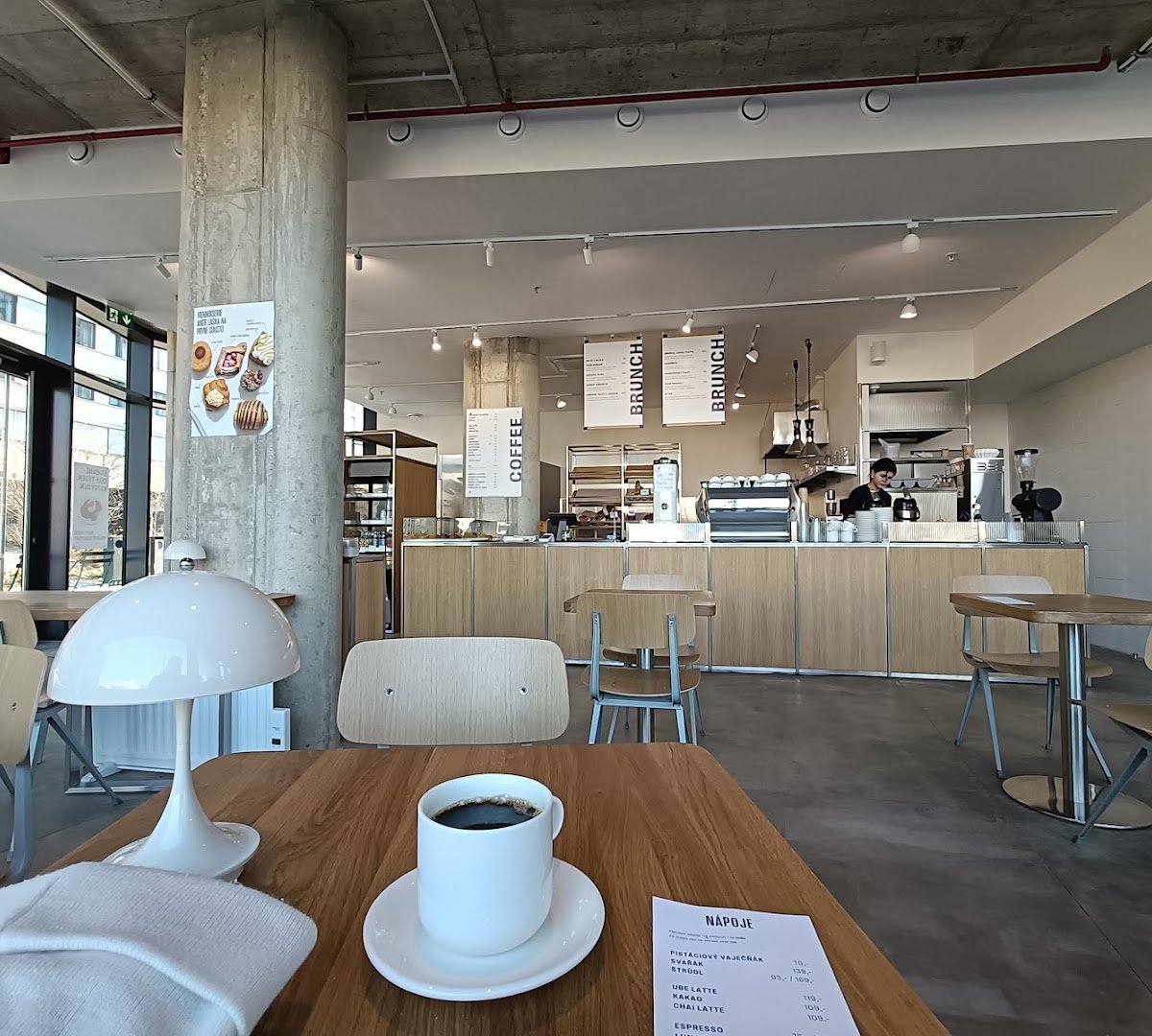 Interior of TISSE Bakery Smíchov, specialty coffee shop in Prague
