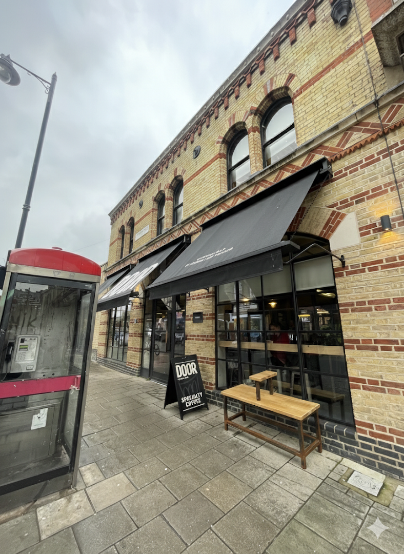 Storefront of Door Coffee Bar, specialty coffee shop in London