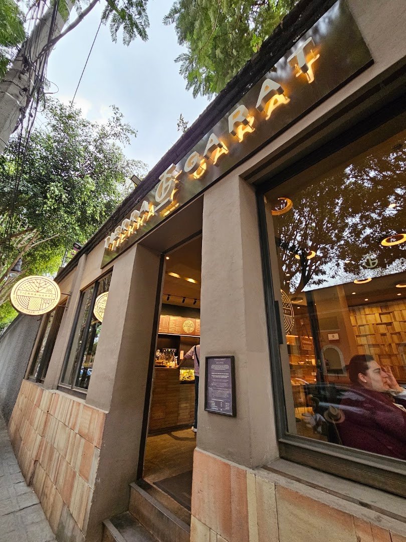 Storefront of Tierra Garat, Hidalgo, specialty coffee shop in Mexico City