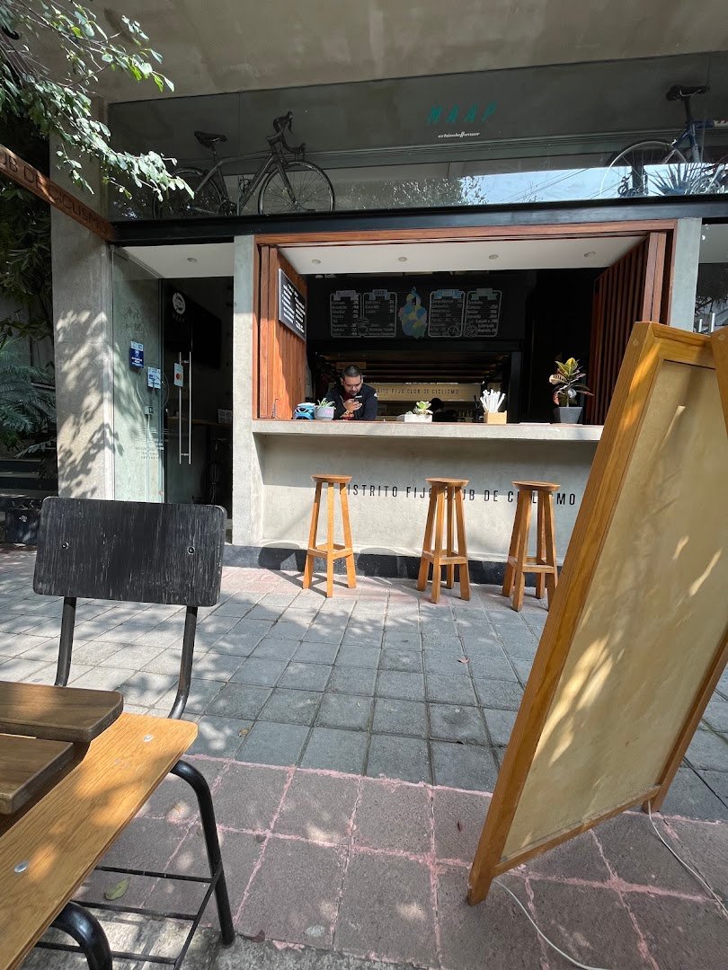 Storefront of Distrito Fijo Club de Ciclismo, specialty coffee shop in Mexico City