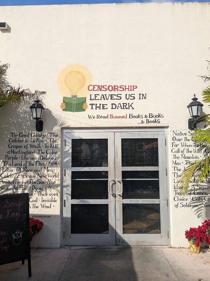 Storefront of The Café at Books & Books, specialty coffee shop in Miami