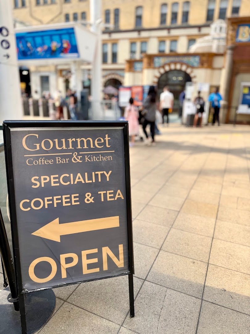 Storefront of Gourmet Coffee Bar & Kitchen, specialty coffee shop in Manchester