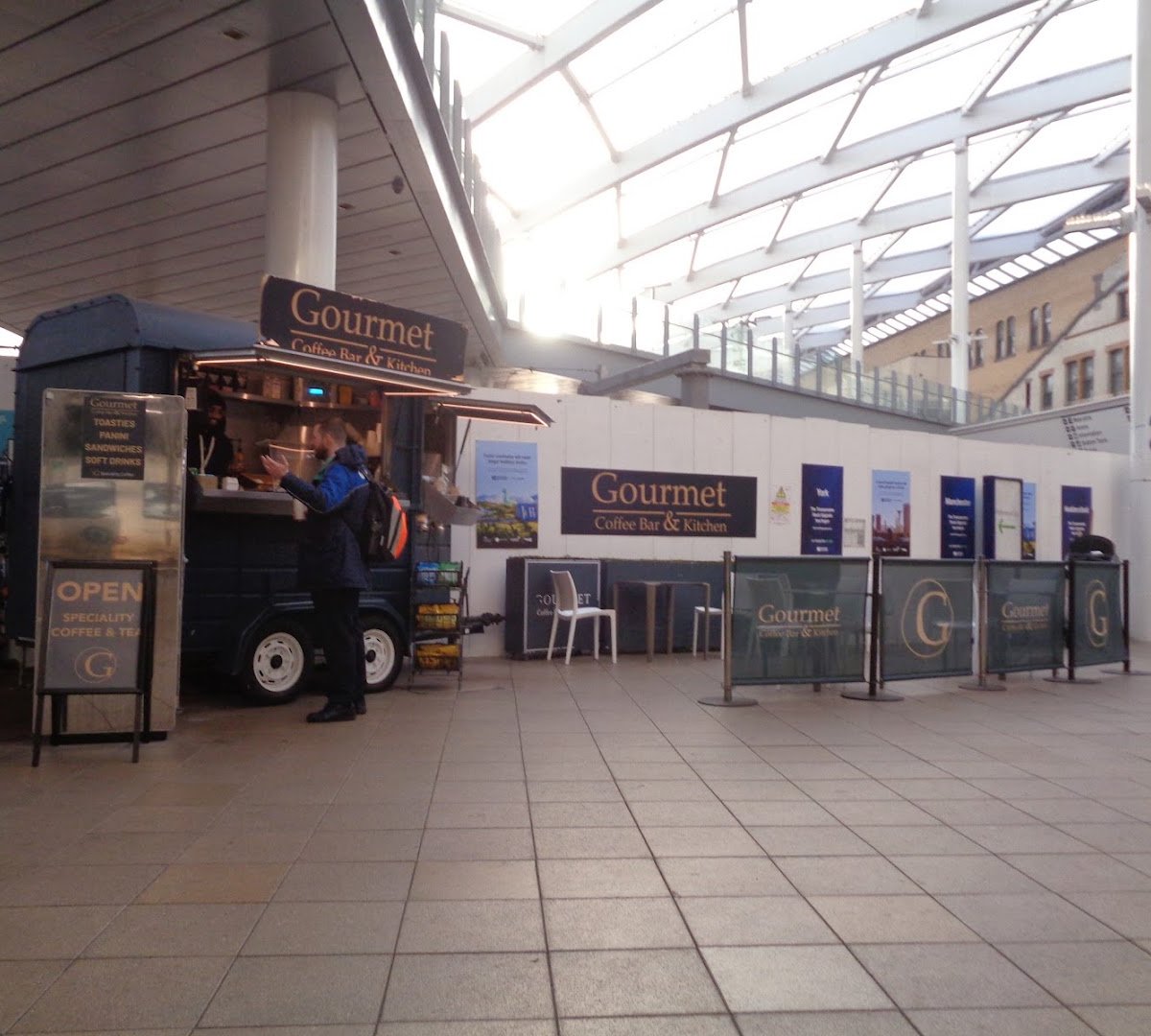 Storefront of Gourmet Coffee Bar & Kitchen, specialty coffee shop in Manchester