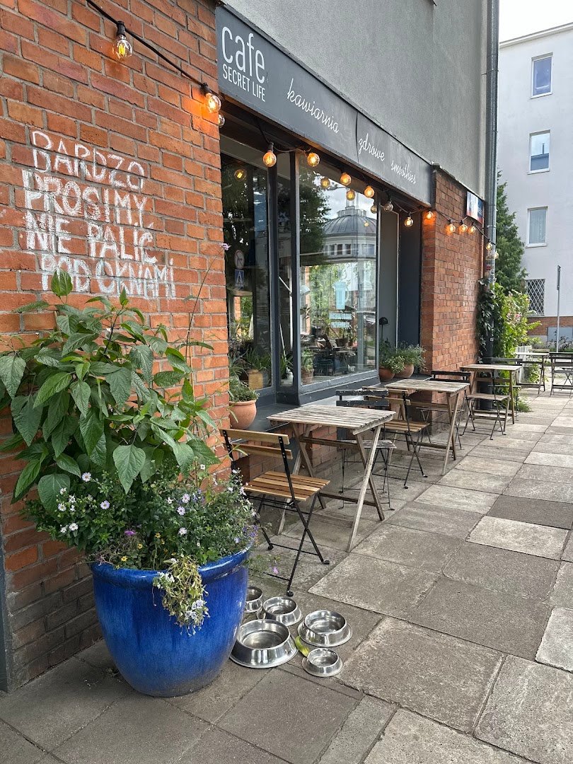 Storefront of Secret Life Cafe, specialty coffee shop in Warsaw