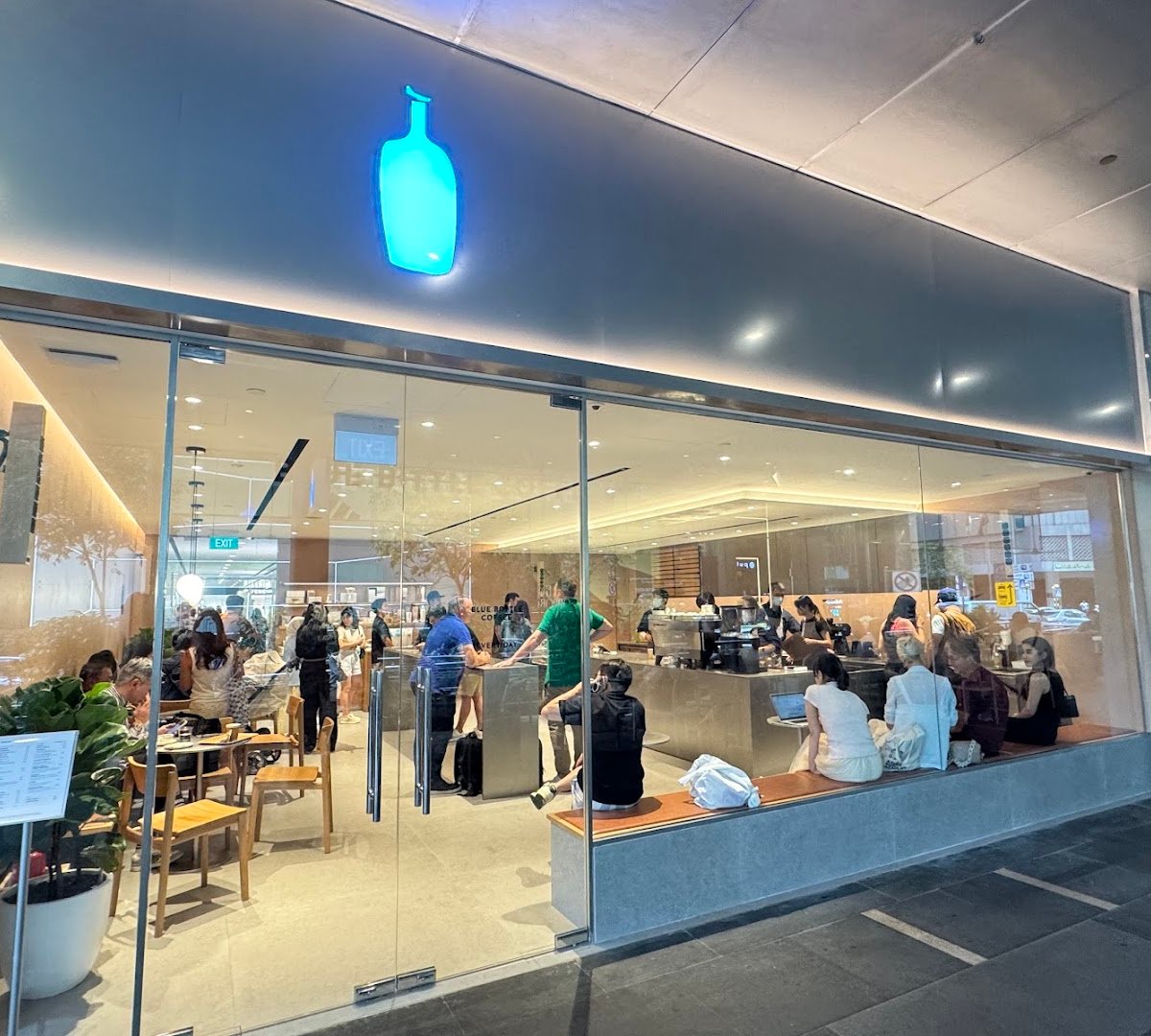 Storefront of Blue Bottle Coffee, specialty coffee shop in Singapore