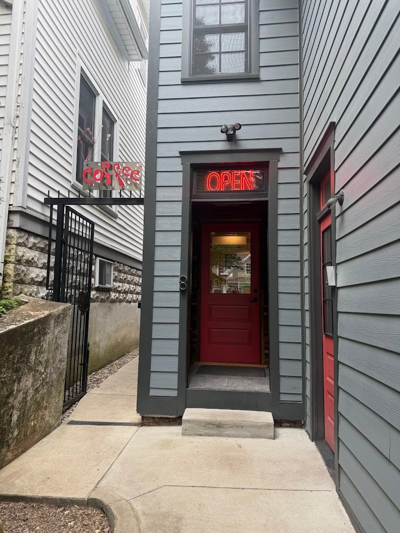 Storefront of Hinterhof Coffee Rösteri, specialty coffee shop in Louisville