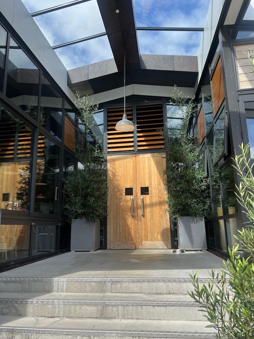 Storefront of Acme Coffee, specialty coffee shop in Wellington