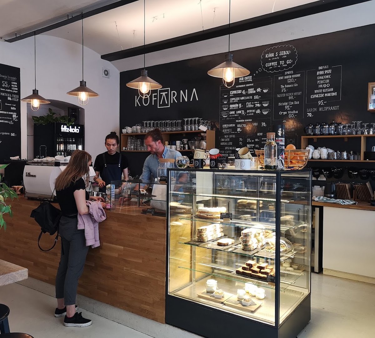 Interior of Kofárna Újezd, specialty coffee shop in Prague