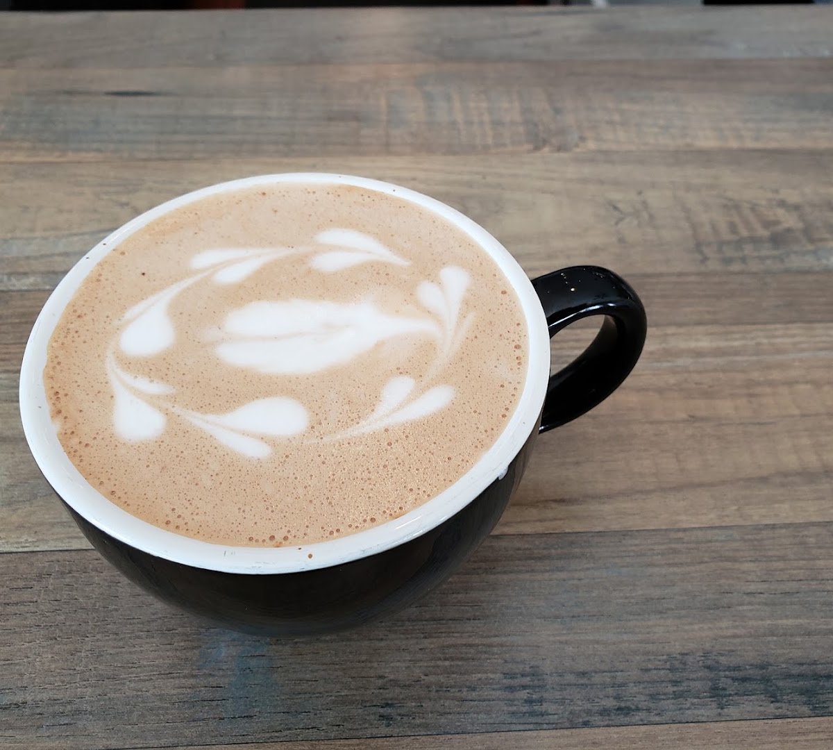 Coffee at Sisters' Sludge Coffee Cafe and Wine Bar, specialty coffee shop in Minneapolis
