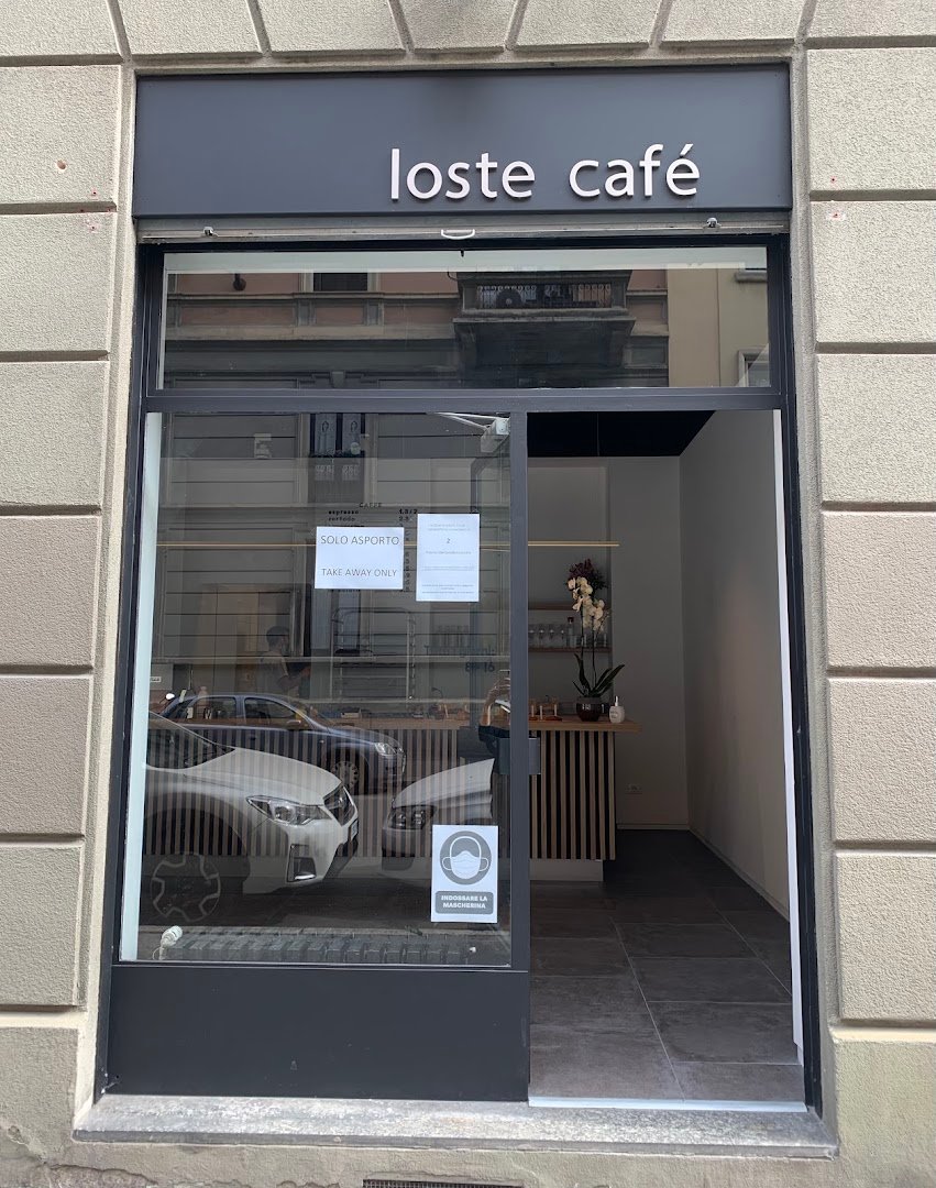 Storefront of Loste Café, specialty coffee shop in Milan