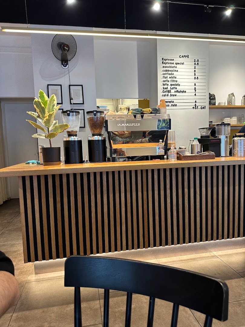 Interior of Loste Café, specialty coffee shop in Milan