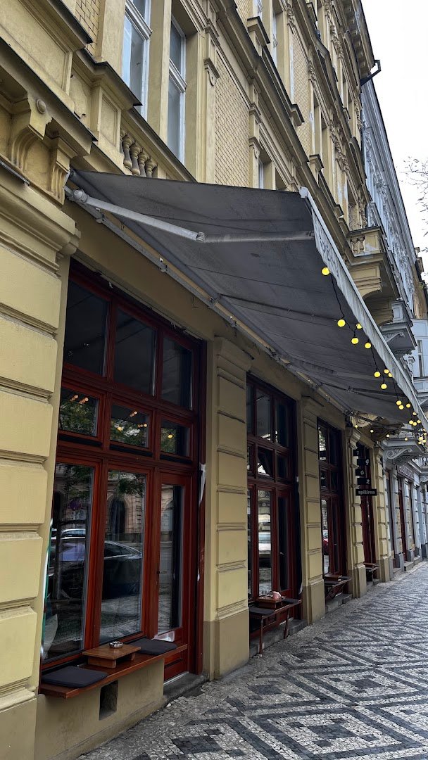 Storefront of Spižírna 1902, specialty coffee shop in Prague