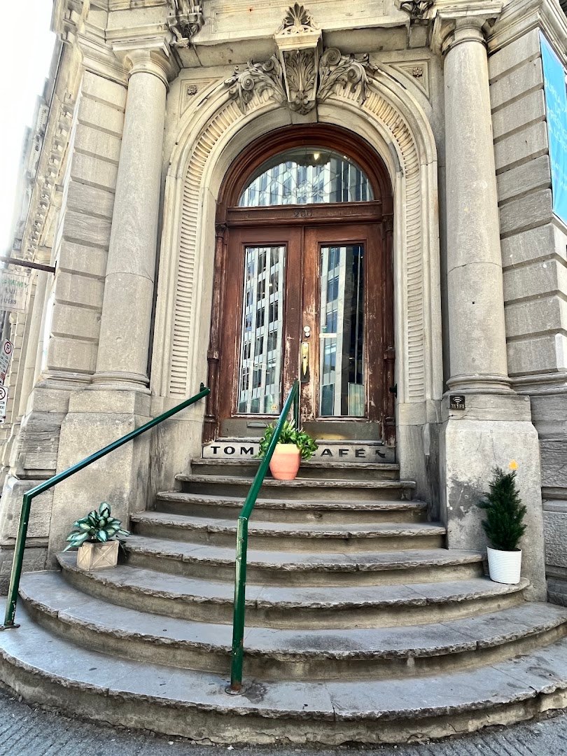 Storefront of Tommy Café, specialty coffee shop in Montreal